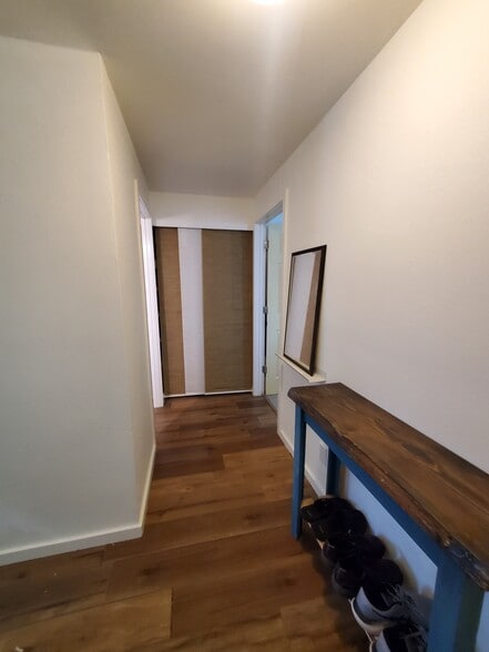 hall storage area (behind sliding curtains) - 310 S 174th Pl