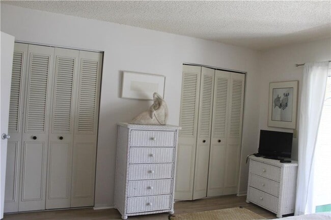 Building Photo - ANNUAL RENTAL 1/1 COMING SOON 55+