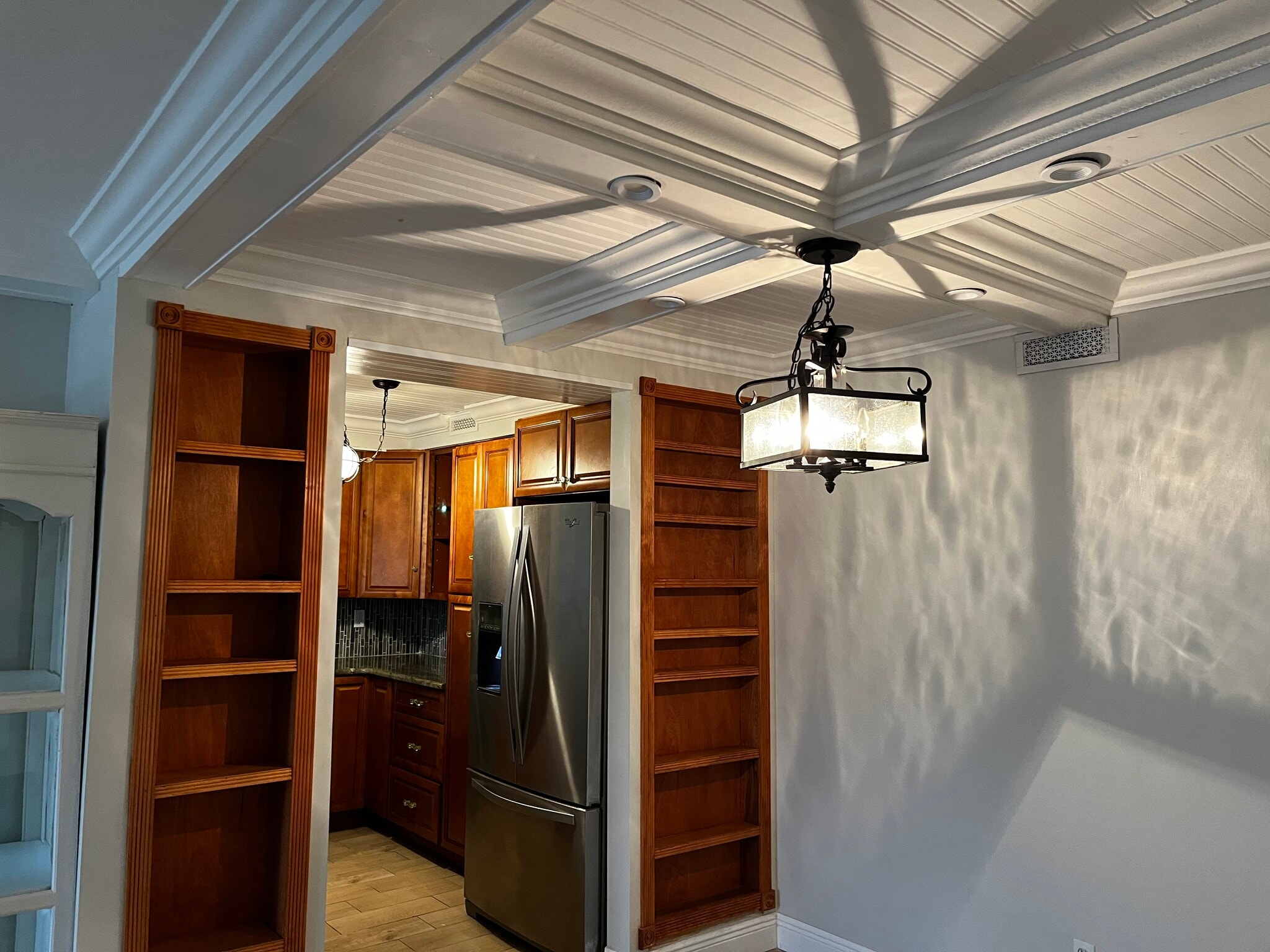 View from dining area, built in shelves, tray ceilings - 1224 S Peninsula Dr