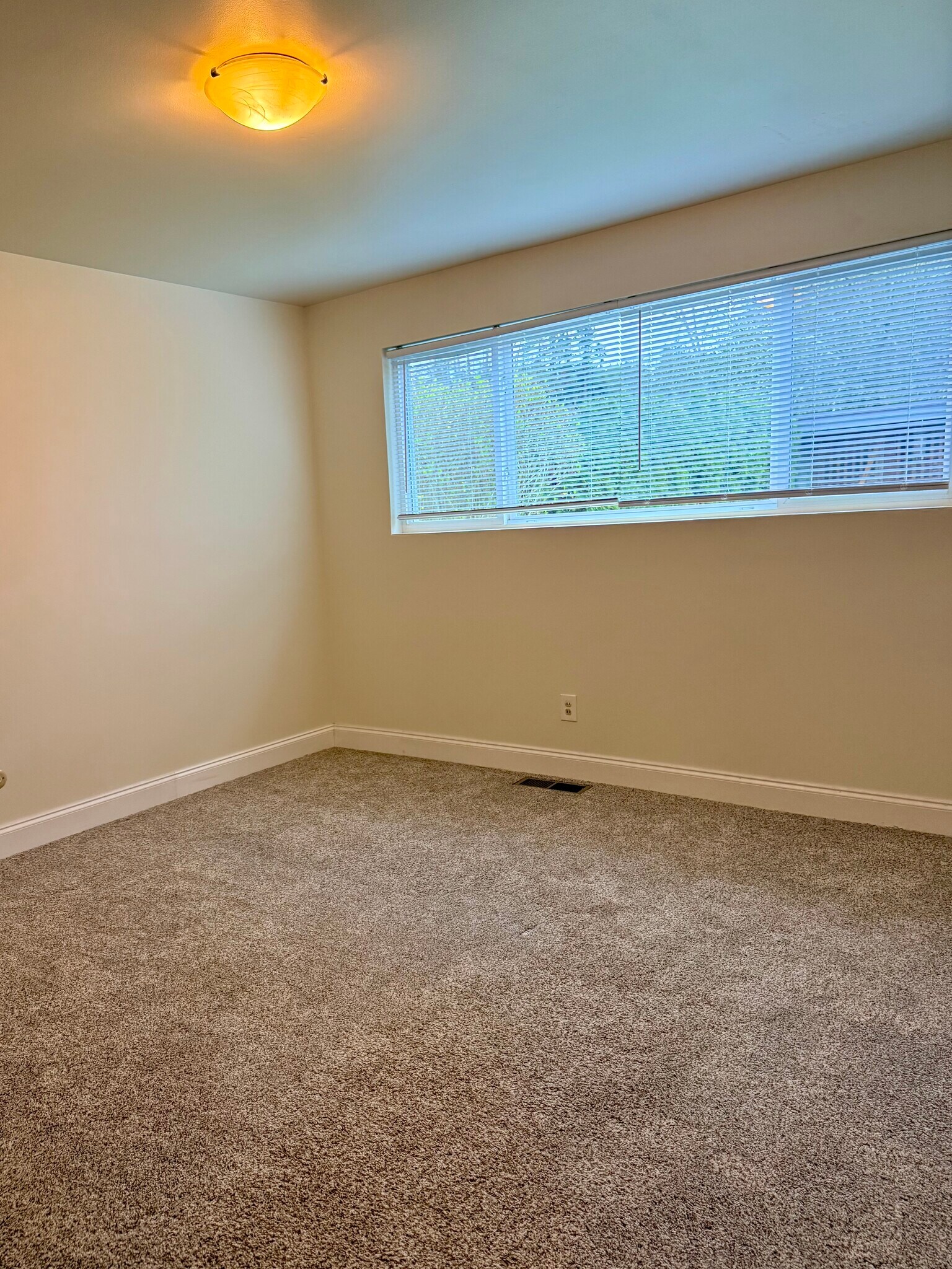 Primary bedroom with double closets - 10734 35th Ave NE