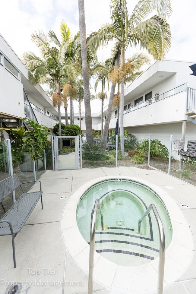 Building Photo - 2-bed, 2-bath 972sqft condo, walking distance to beach in Carlsbad Village, literally one block o...