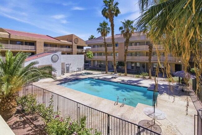 Building Photo - Top-floor studio apartment! Recently renovated with brand new flooring and paint throughout.