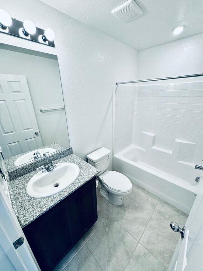 Building Photo - AMAZING, CORNER LOT, UPGRADED TOWNHOME IN "HENDERSON!!"  NEXT DOOR TO COMMUNITY DOG PARK!!