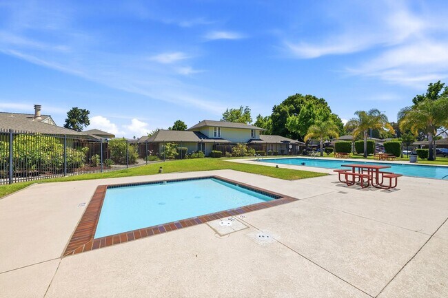 Building Photo - Spacious 2BD/1.5BA Fremont Townhouse | In-Unit W/D | Community Pool & Hot Tub | Carport Parking