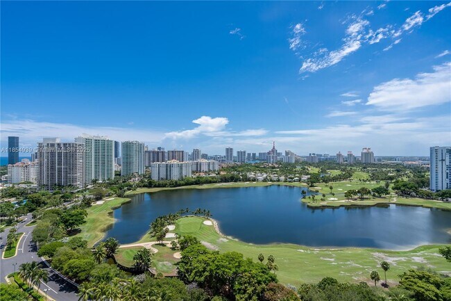 Building Photo - 3675 N Country Club Dr