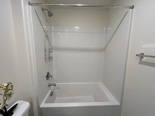 Building Photo - FULLY FURNISHED!!! beautiful 3 bedroom 2 and half bath home is located in the Symmetry Bay Cadenc...