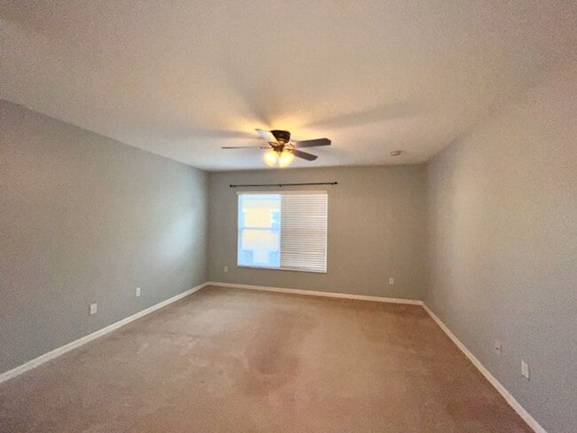 Building Photo - AVAILABLE NOW! Charming 2 Beds 2.5 Bath Townhome! 2 MASTER SUITES! Attached one car garage!! Extr...