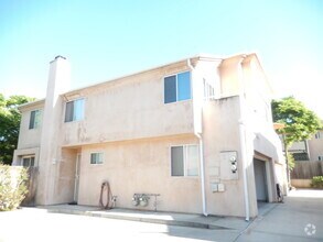 Building Photo - Updated Two Story Townhome w/ Two Car Garage