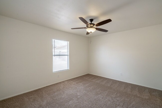 Building Photo - Updated home with large backyard & 2 car g...
