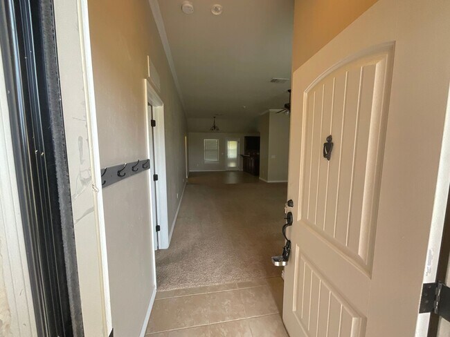 Building Photo - 4 bed, 2 bath, 2 car garage, 12-14 person Storm Shelter