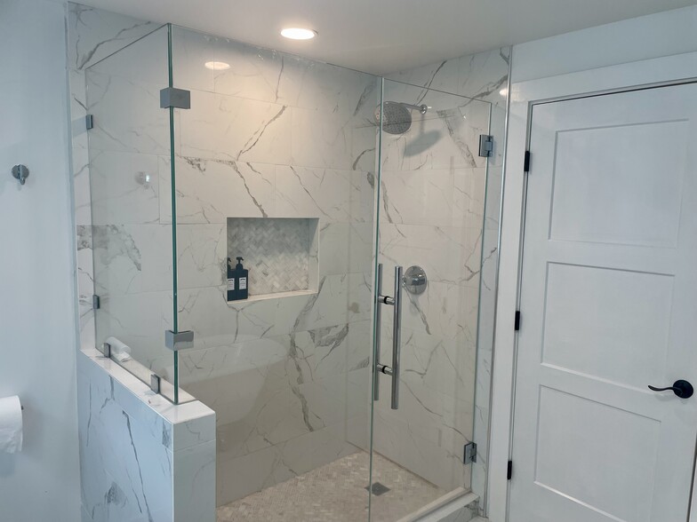 Upstairs bath with shower and soaking tub. - 83 Lehner St