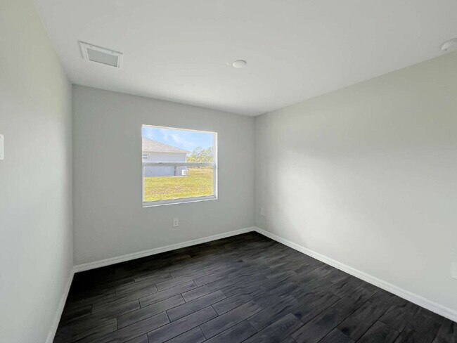 Building Photo - Move-In Special! Half Month FREE – APPLY b...