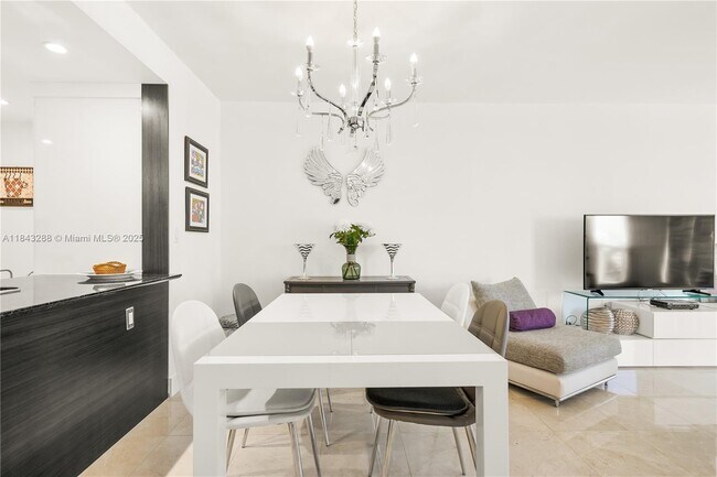 Building Photo - 10275 Collins Ave
