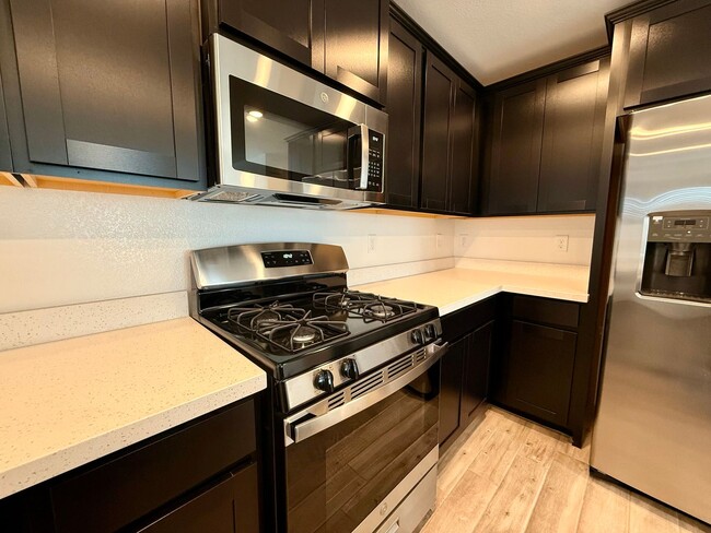 Building Photo - 4 BED 3 BATH 2 CAR GARAGE TOWNHOUSE + LOFT ON CORNER LOT w/ BALCONY