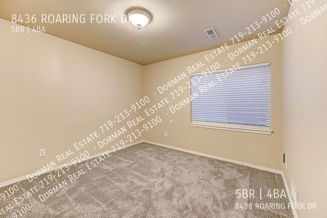 Building Photo - 8436 Roaring Fork Dr