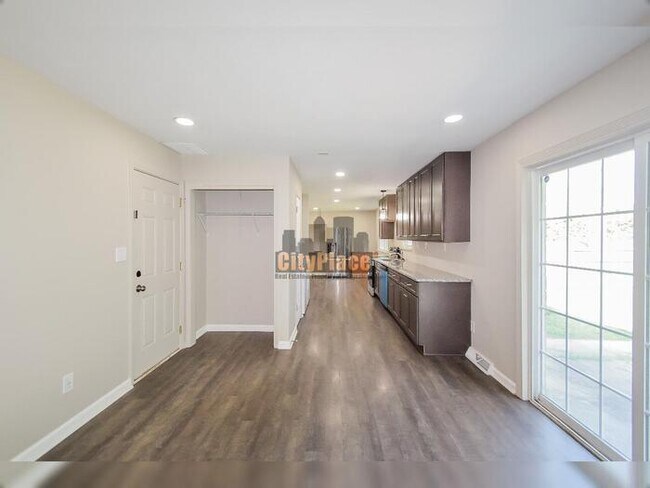 Building Photo - 7504 Honnen Dr N