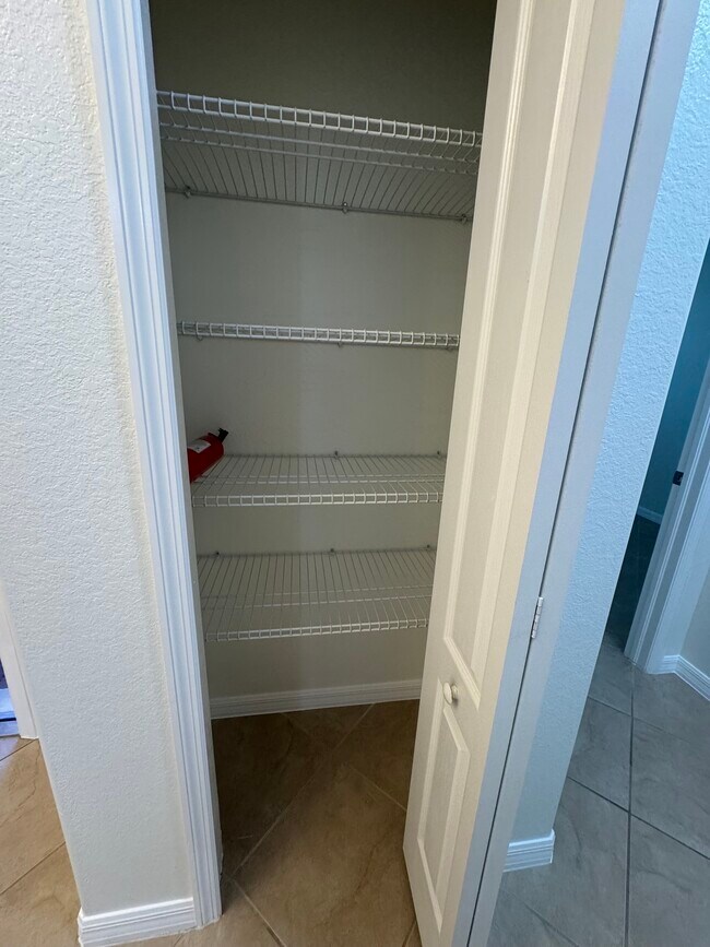 Side Hall Linen Closet - 10510 Yorkstone Dr