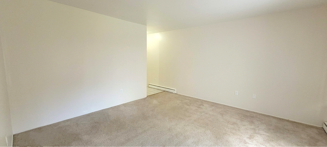 Building Photo - 2-Bedroom Garden-Level Unit | Parking, Patio & Water Included