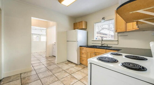 Building Photo - "Charming 2-Bedroom Retreat with Hardwood ...