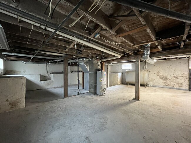 Building Photo - Character-Filled Concordia Home with Flexible Living Spaces & Gas Fireplace