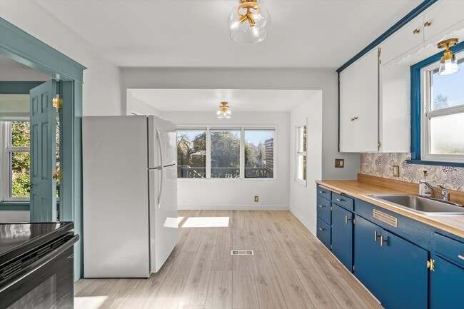 Building Photo - Spacious Tacoma Rental Featuring Large Yard & Entertainer’s Deck