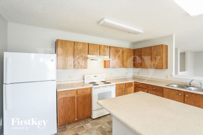 Building Photo - 6827 W Littleton Dr
