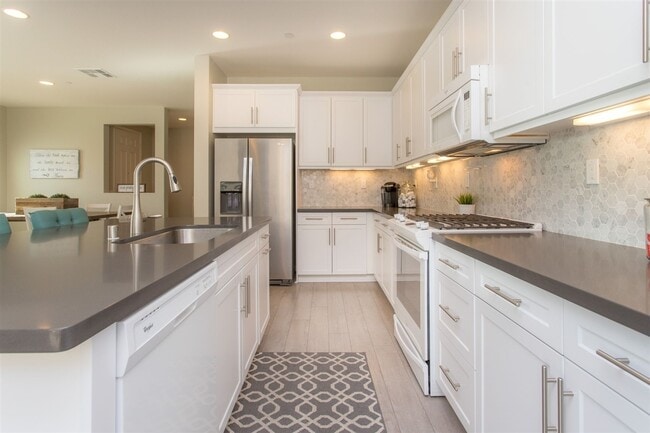 Building Photo - MUST SEE!!! Newer construction build w/ fixed SDGE Bill! Central A/C and Heat!