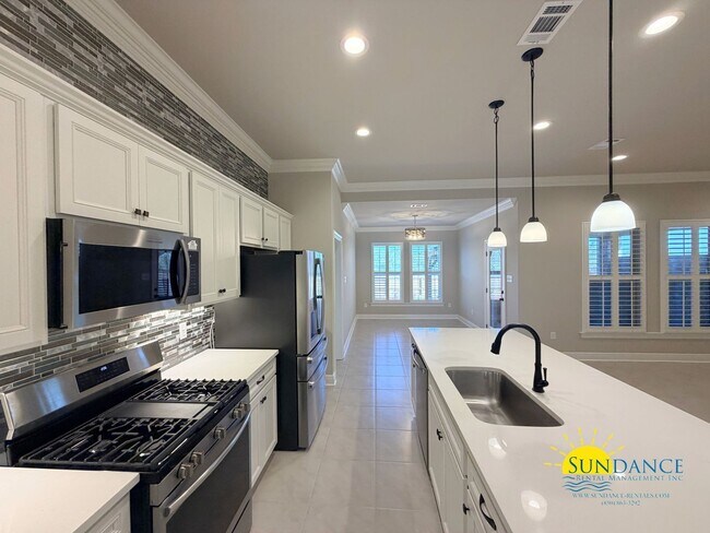 Building Photo - Custom-crafted details shine throughout this stunning 3-bedroom home in Magnolia at the Bluffs in...