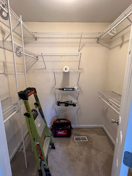 Walk-in closet in the master bedroom. - 176 Duer St