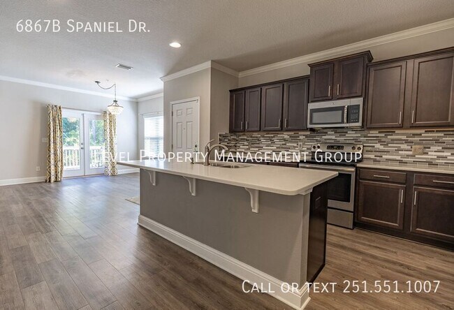 Building Photo - 6867B Spaniel Dr.-