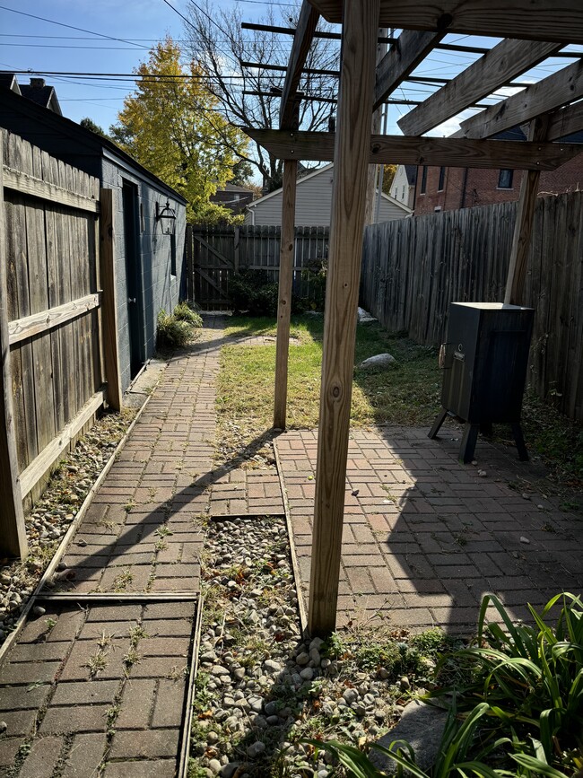 Backyard with walkway to alley for trash - 1049 Franklin Ave