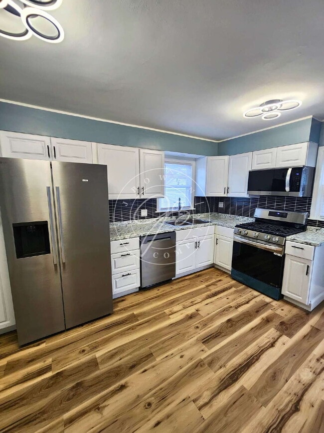 Building Photo - Charming 3-Bed Home with Finished Basement and large dormer!