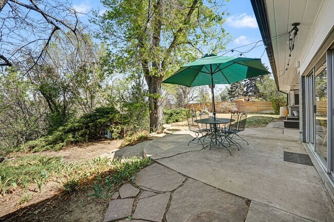 Building Photo - Sunlit Wheat Ridge Gem with Huge Wooded Backyard