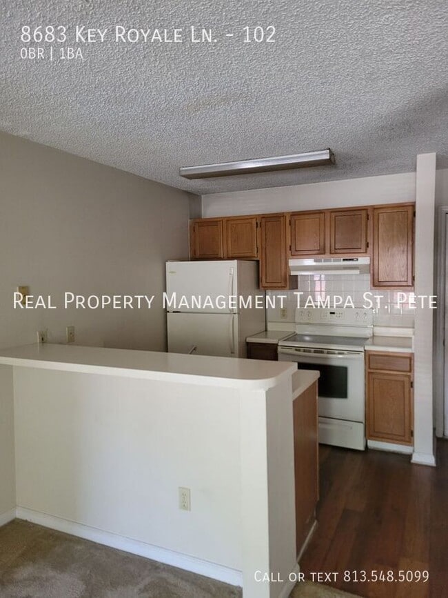 Building Photo - 8683 Key Royale Ln