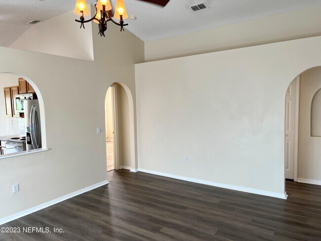 Building Photo - 6580 Gentle Oaks Dr N