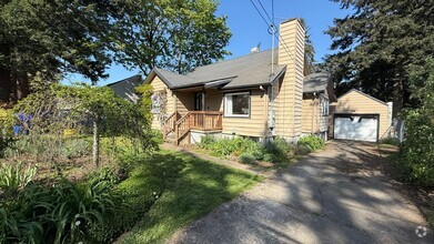 Building Photo - Country Charm Meets City Convenience – 4 B...