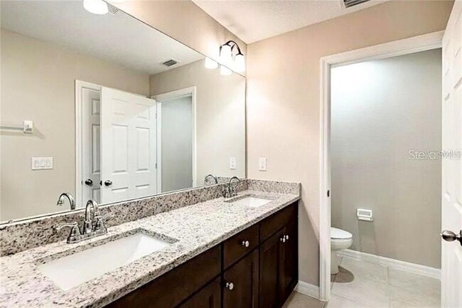 Building Photo - 6320 Tillandsia Pl