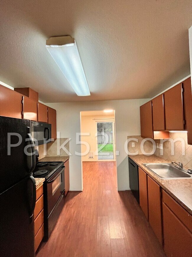 Building Photo - $250 Off First Full Month! 2 Bedroom Ground Floor Apartment With Backyard