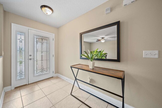 Building Photo - Luxurious Palm Coast Retreat: 4-Bed 3 Bath...