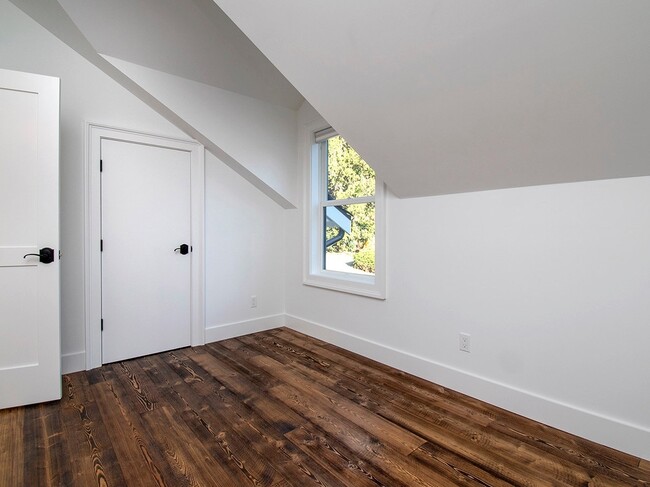 Building Photo - Expansive Loft-Style Carriage House in Private Haller Lake Estate