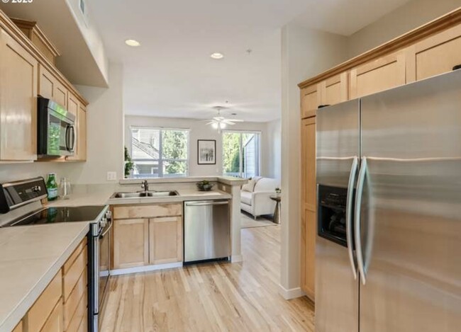 Kitchen looking out to living room - 2871 NW Kennedy Ct