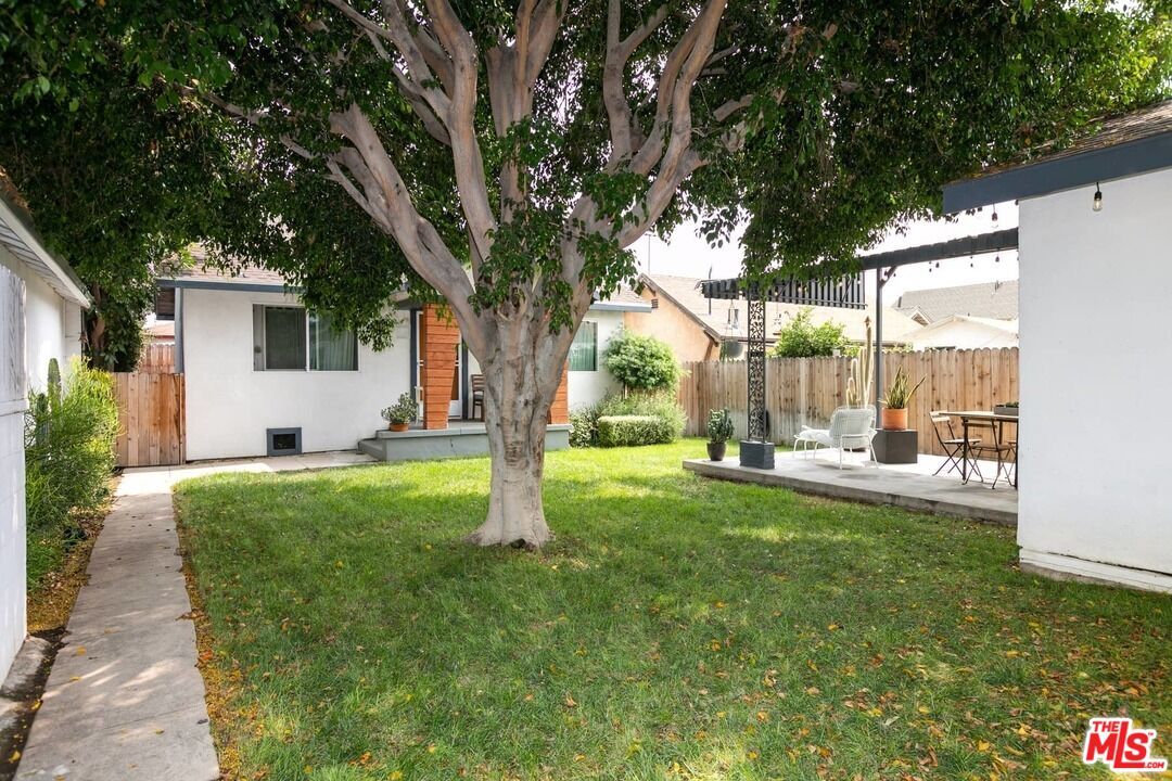 Shared backyard and the other house on the lot - 632 S Evergreen Ave