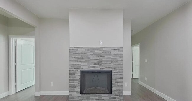 Building Photo - Spacious, Stylish, and Simply Perfect — 4 Bedroom Home