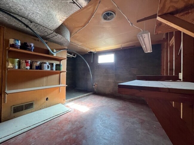 Building Photo - Bi-Level House w/ Massive Backyard, Storage, & Character!