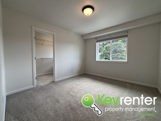 Building Photo - Stylish 4-Bedroom Home with Finished Basem...