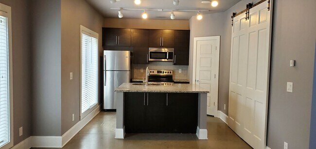 Building Photo - Luxury Student Living- 4BR/4BA Townhome Near UGA (Available Fall 2026)