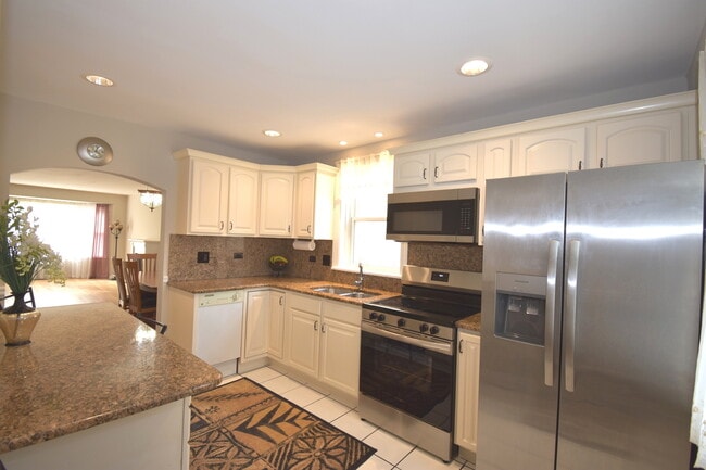 Building Photo - 3855 N Nora Ave