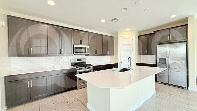 Building Photo - 9345 W Heatherbrae Dr