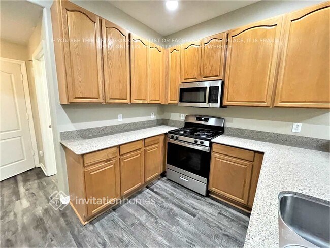 Building Photo - 9464 Leatherwood Ave