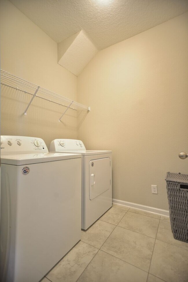 Building Photo - Beautiful Pond-Front Home Near Amelia Concourse